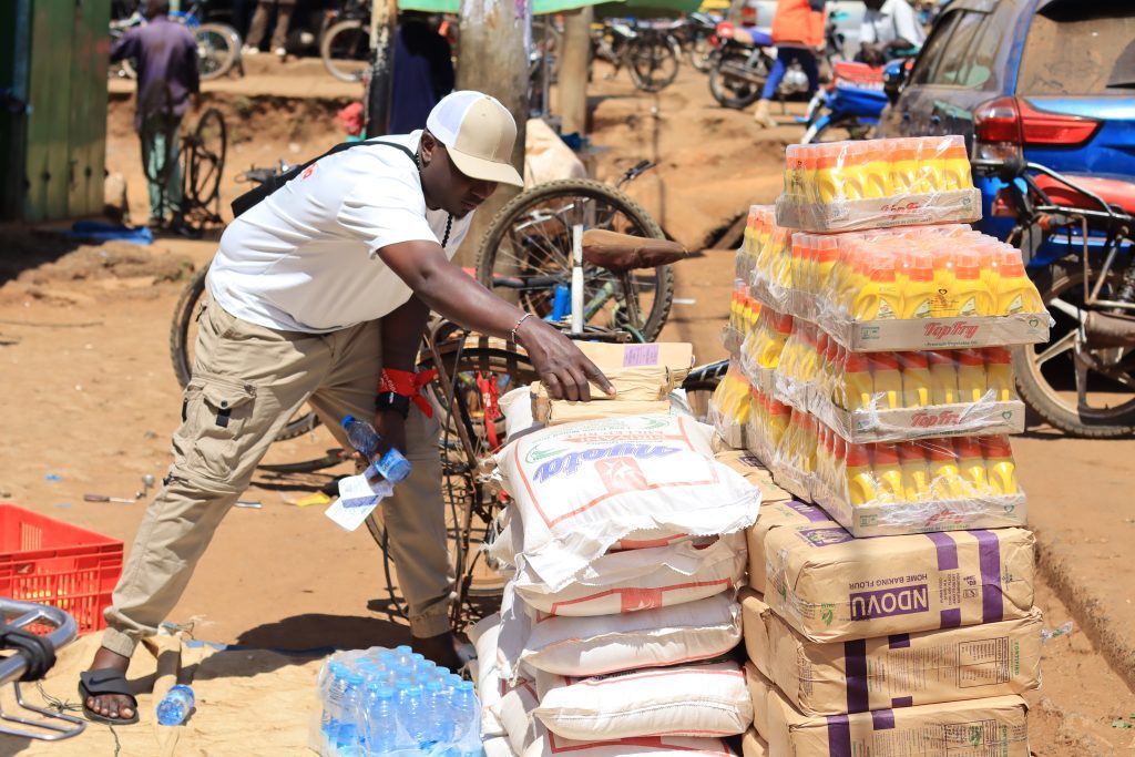 Sacks of flour, cooking oil and water stacked ready for distribution